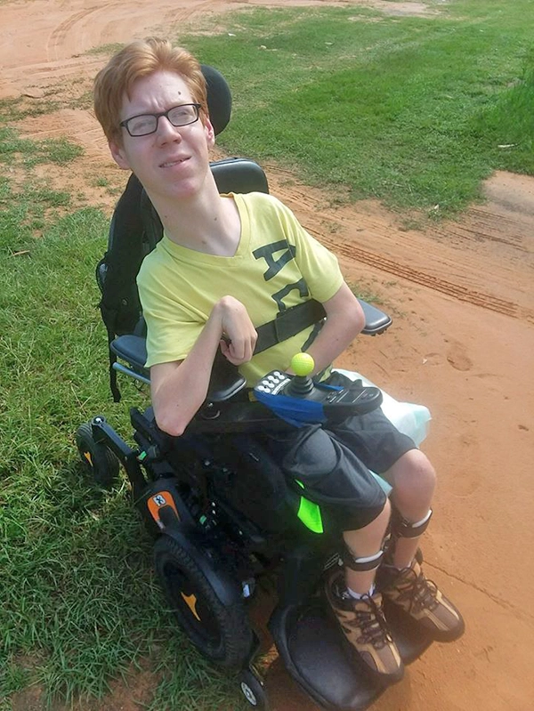 Hunter using his Powerchair with his new batteries, empowering him to live more independently