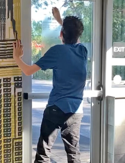 An 18-year old high school student with Autism was provided with skills training during a summer career camp. Pictured here working at his new job at McDonald’s.