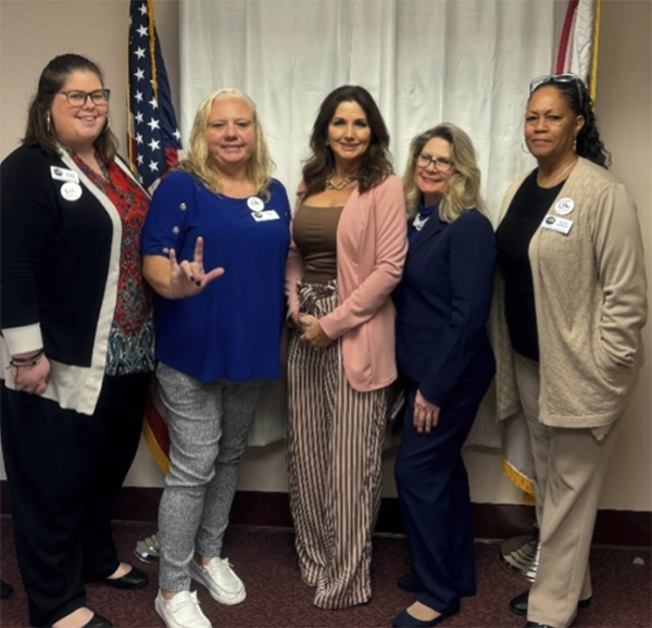 Community Member Bridgett Johnson, Team members Diana Arnold, Carolyn Grawi, and Karen Teamer with State Representative Salzman